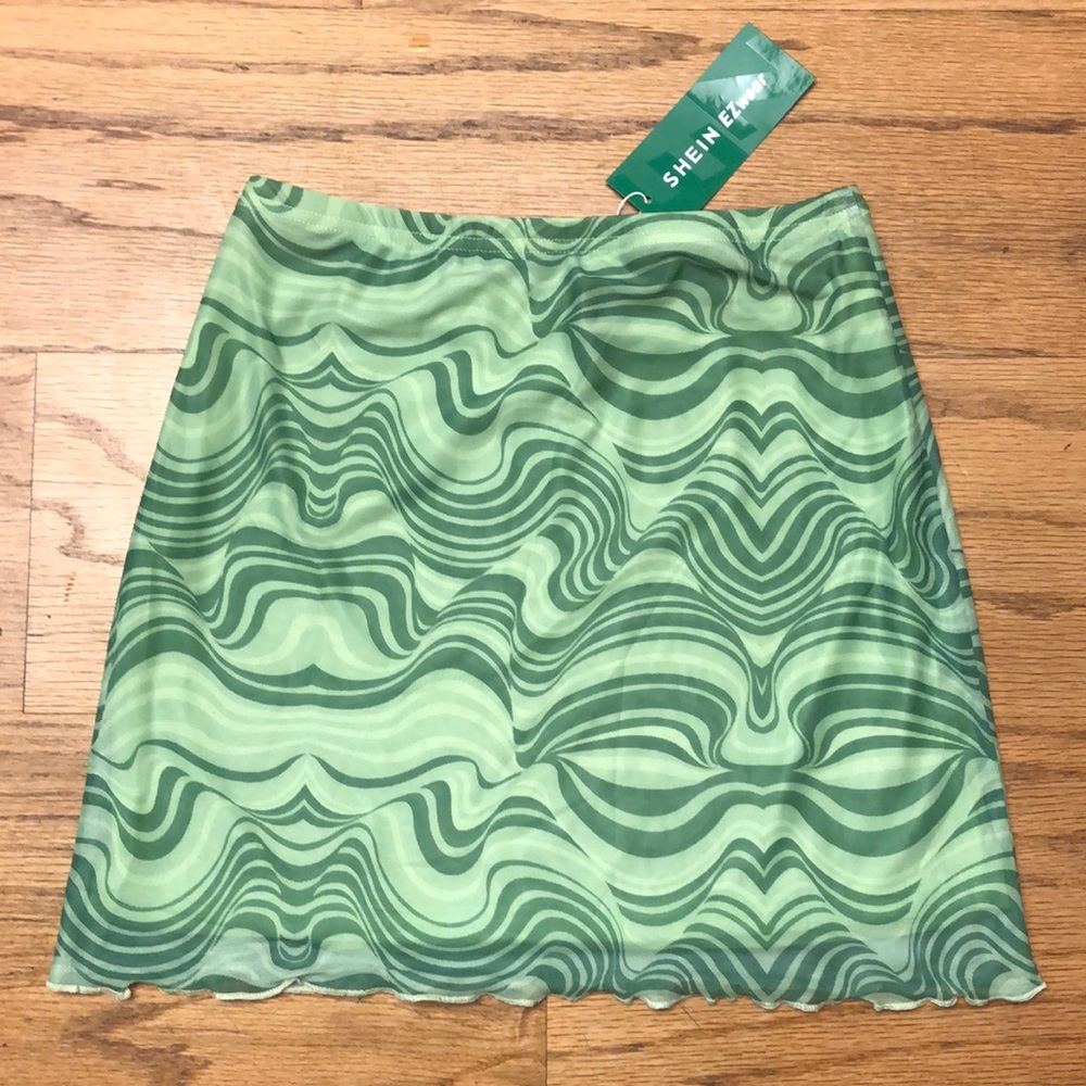 green swirly mini skirt